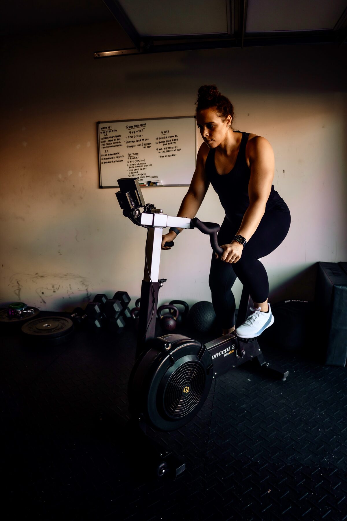 Woman riding a bike erg